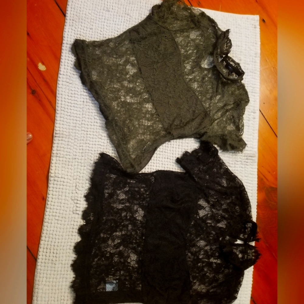 2 blouses zip up side. Both size medium (runs small) Adorable for a fit woman.